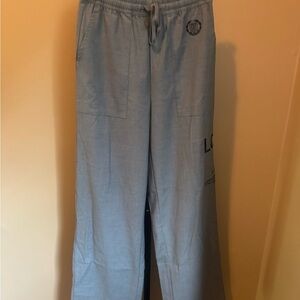 Light Blue Pants with Logo Detail